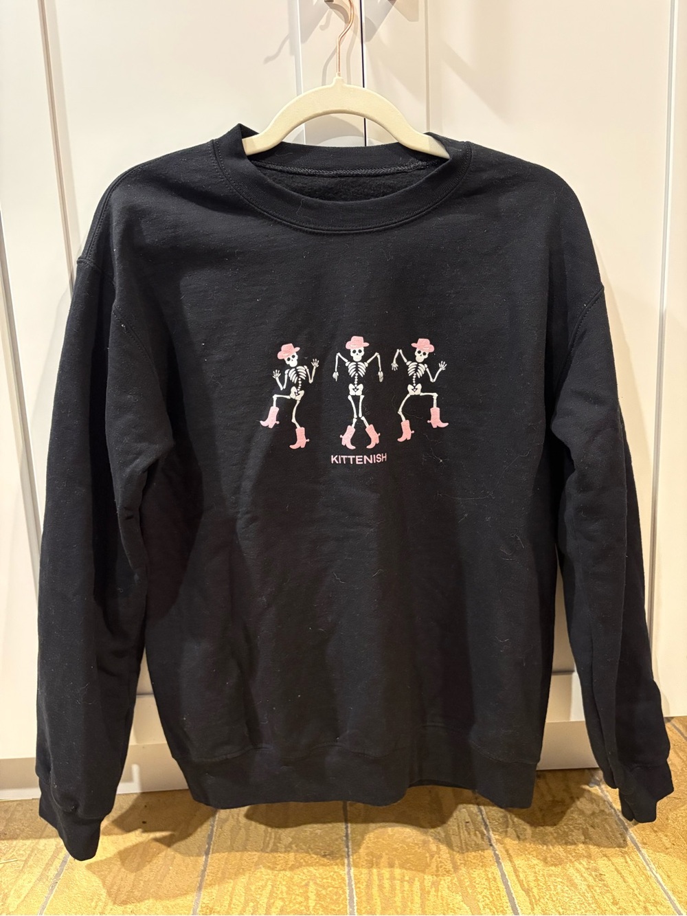 Kittenish Black Crewneck with Pink Skeleton Trio Graphic